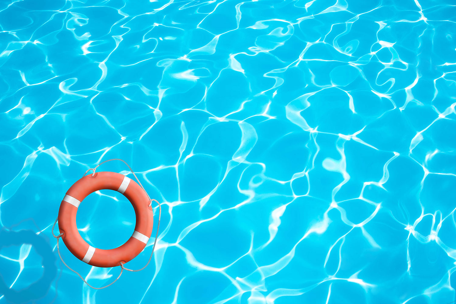 Pool safety tips and buoy in pool