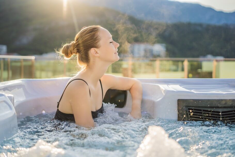 Woman soaking in a hot tub